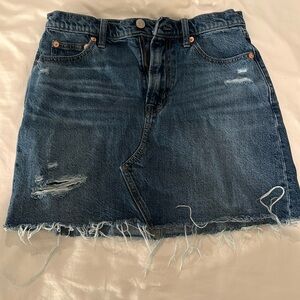 Denim miniskirt with distressed details
